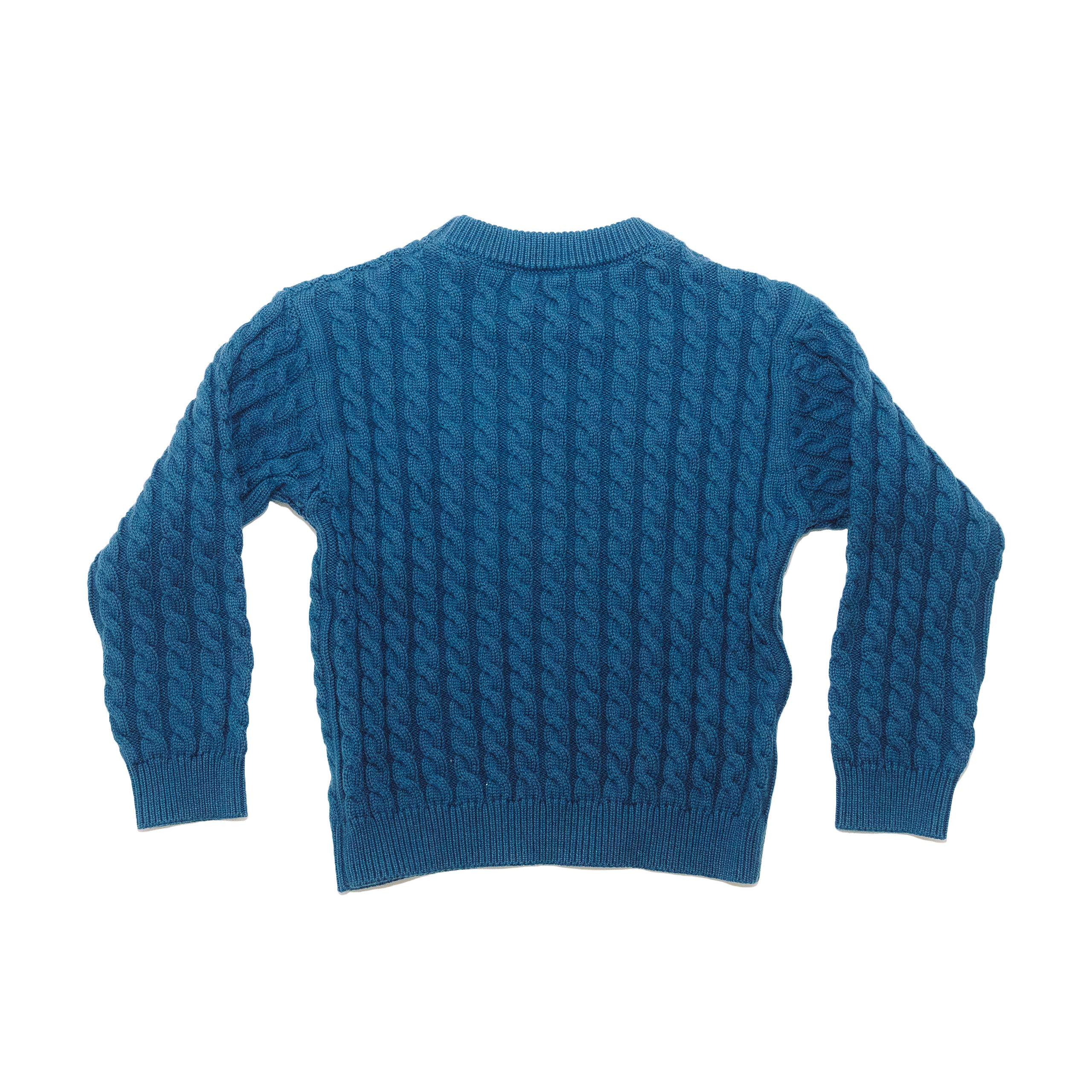 Blue cable knit sweater back product shot. 