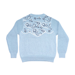 Back of women's chambray blue bandana pattern sweater. 